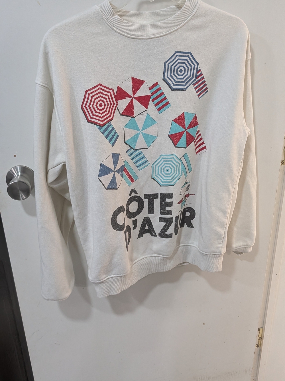 Peanuts White Sweatshirt with Black Logo Tag
